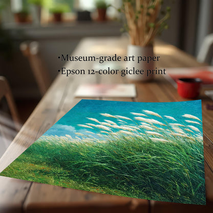 Detail shot of the art print of the windy grass field, laying on a wooden table. Text overlay highlights product quality: Museum-grade art paper and Epson 12-color giclee print.