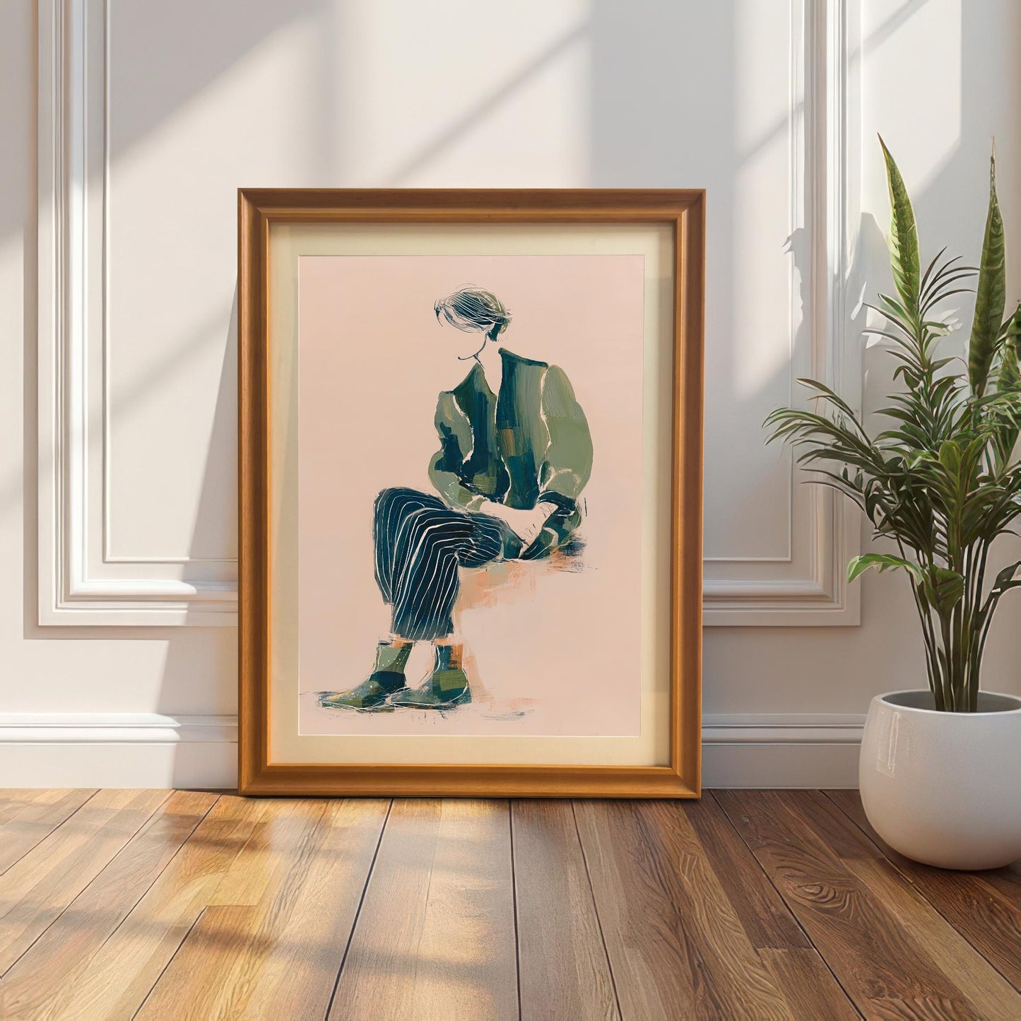 Lifestyle photo of the art print in an Orange wood frame leaning on the floor against a white wall with molding next to a potted snake plant.