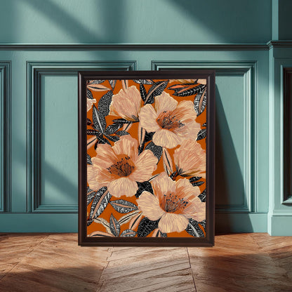 Lifestyle photo of the floral art print in a Coffee wood frame leaning on a wooden floor against a paneled teal blue/green wall.