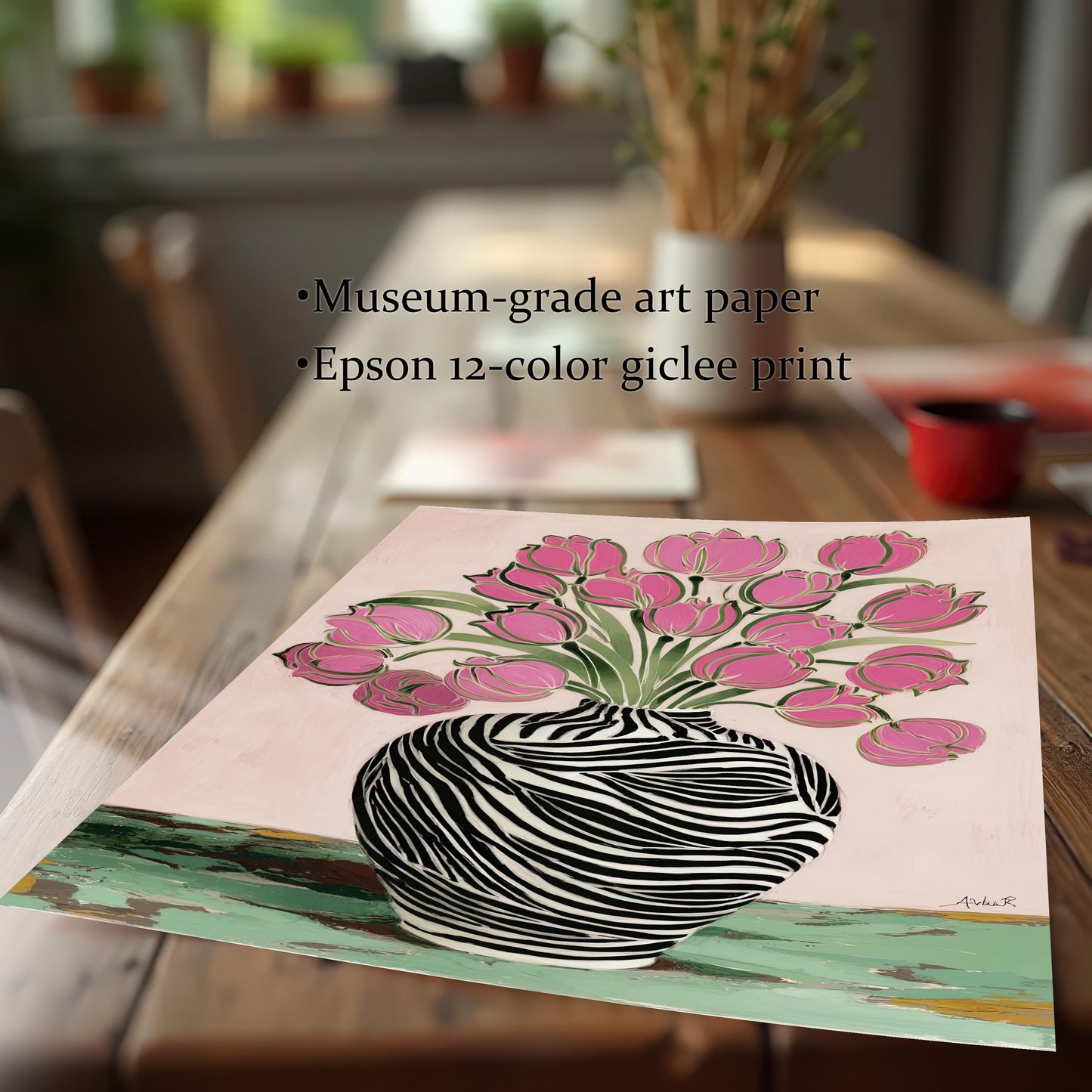 Close-up of the Zebra Vase and Pink Tulips art print on a wooden table, emphasizing the print quality features: Museum-grade art paper and Epson 12-color giclee print.