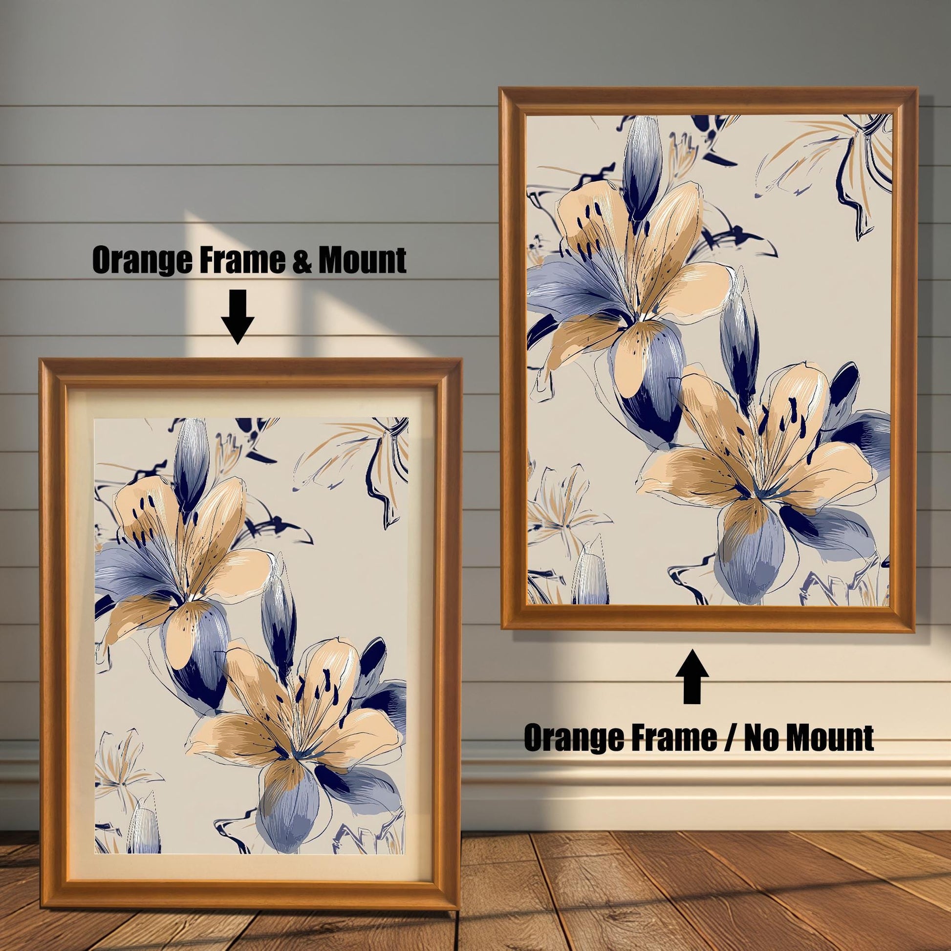 Modern framed print of Navy Blue and Peach/Gold Lilies on a beige background, shown in two orange wood frames. The left frame includes a mount/mat, and the right frame shows the print without a mount/mat.