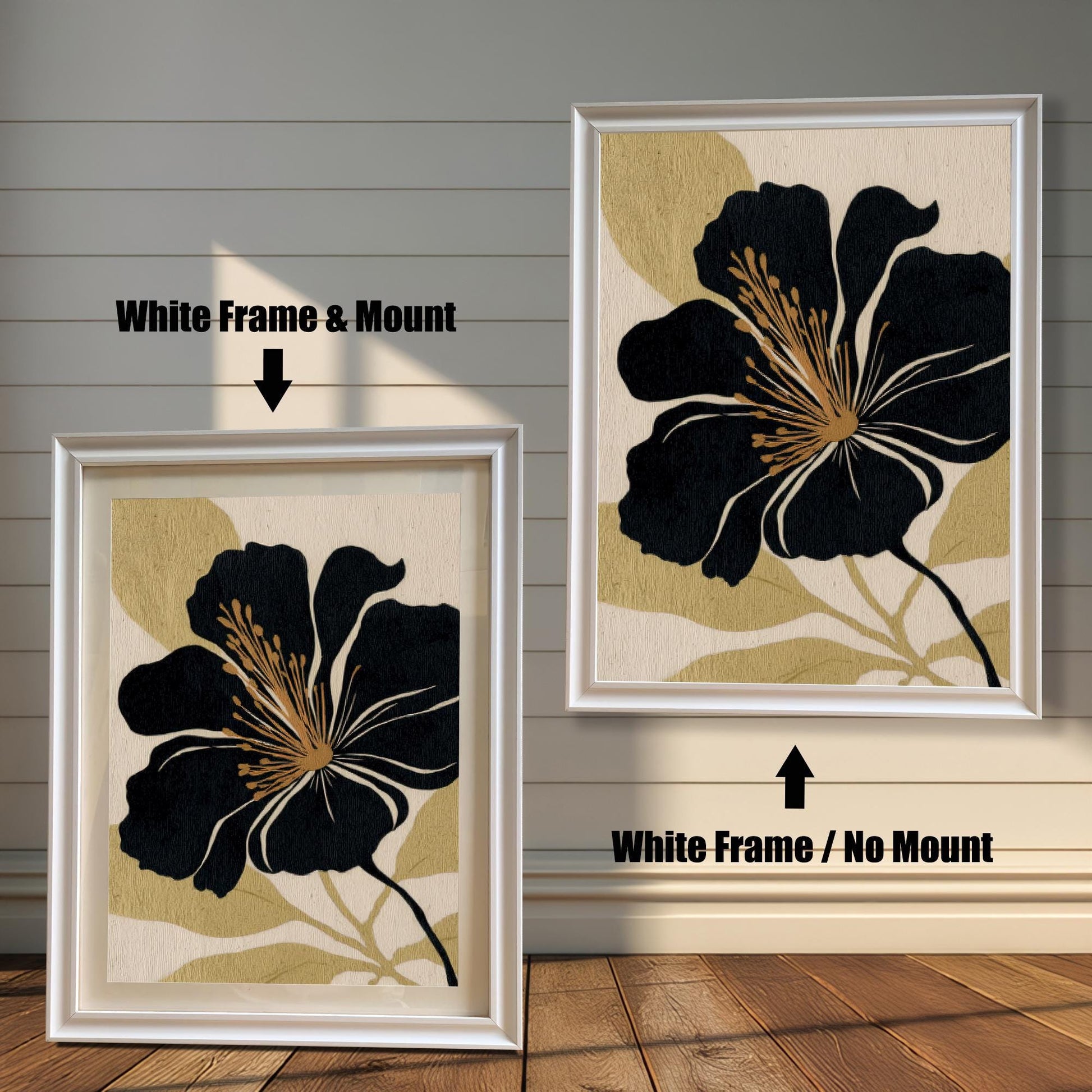 A comparison of two black and gold floral prints against a white wood-paneled wall: one in a White Frame & Mount (matting), and the other in a White Frame / No Mount (no matting).