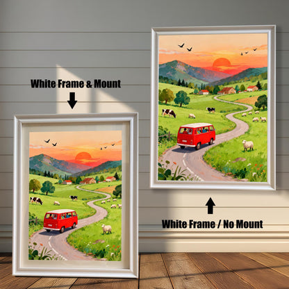 A comparison of two art prints featuring a red camper van on a winding road in a sunset countryside scene. One shows a White Frame & Mount (matting), and the other shows a White Frame / No Mount.