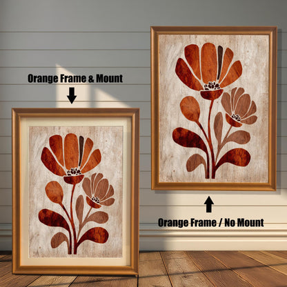 Comparison of two framed art prints: A smaller print with an orange frame and a beige mount/mat, and a larger print with an orange frame but no mount. Both feature the stylized rust-orange floral design. (This focuses on frame color and mounting options.)
