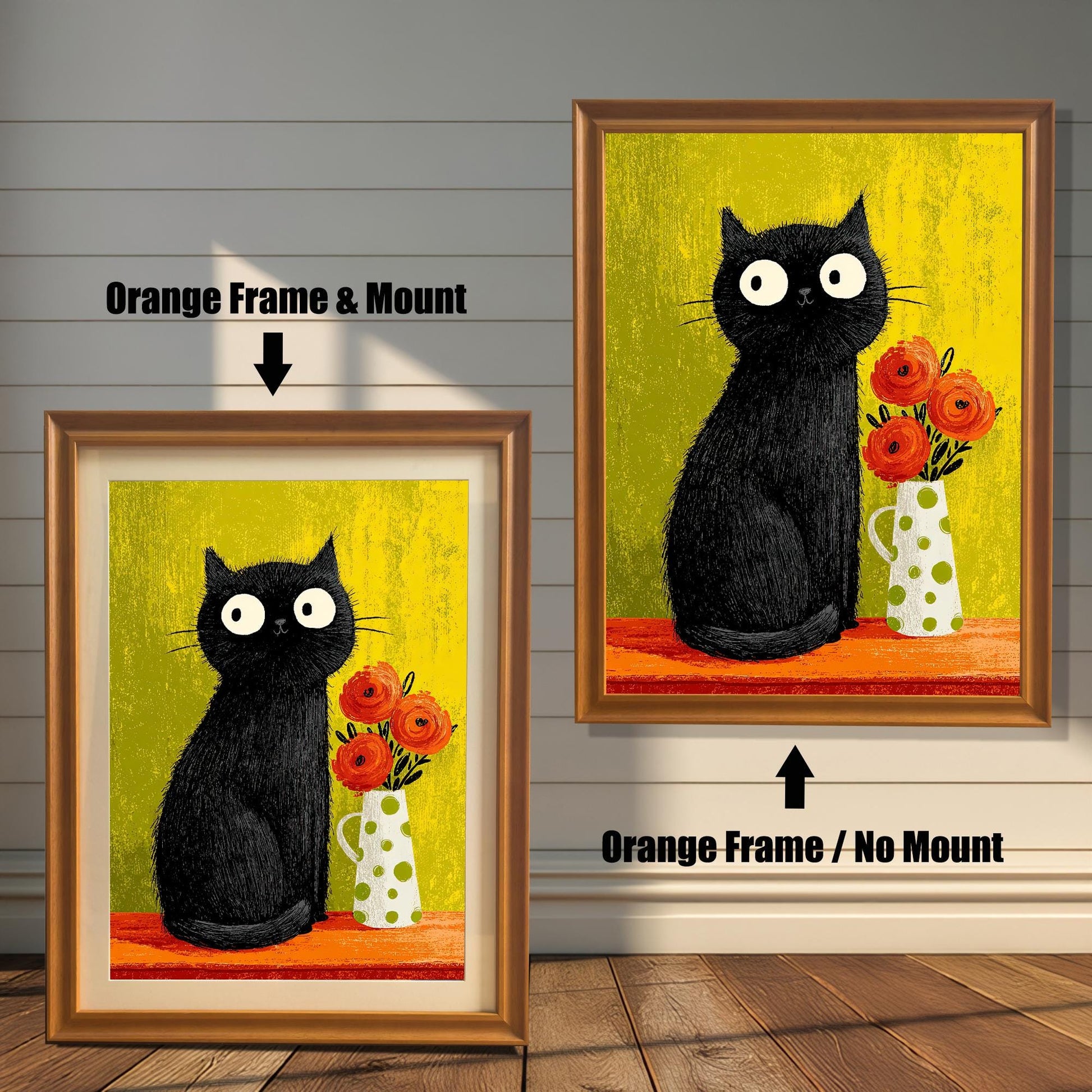Comparison of two framed prints: A smaller print with an Orange/Gold frame and a beige mount/mat, and a larger print with an orange frame but no mount. Both feature the quirky black cat art.