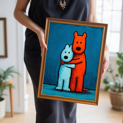 Woman in a black dress holding a small, gold-framed art print of two hugging dogs (one orange, one blue), showcasing the artwork and its frame.