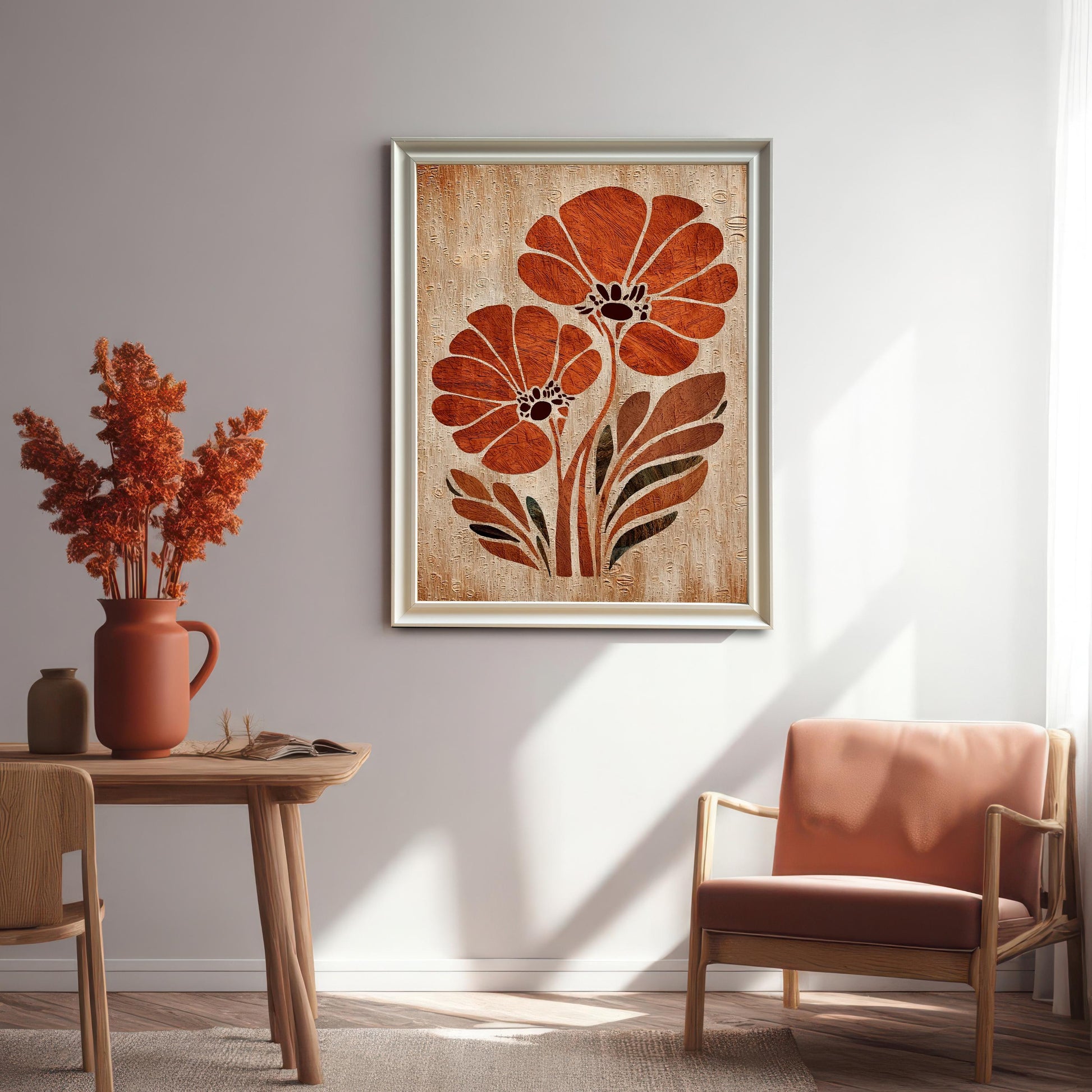 Interior shot of the orange flower art print in a White Wood Frame hanging on a wall above a wooden table and a matching orange chair in a brightly lit, modern room.
