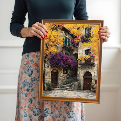 A person holding the framed art print with a gold/orange wood frame to show its scale. The person is wearing a dark top and a floral skirt.