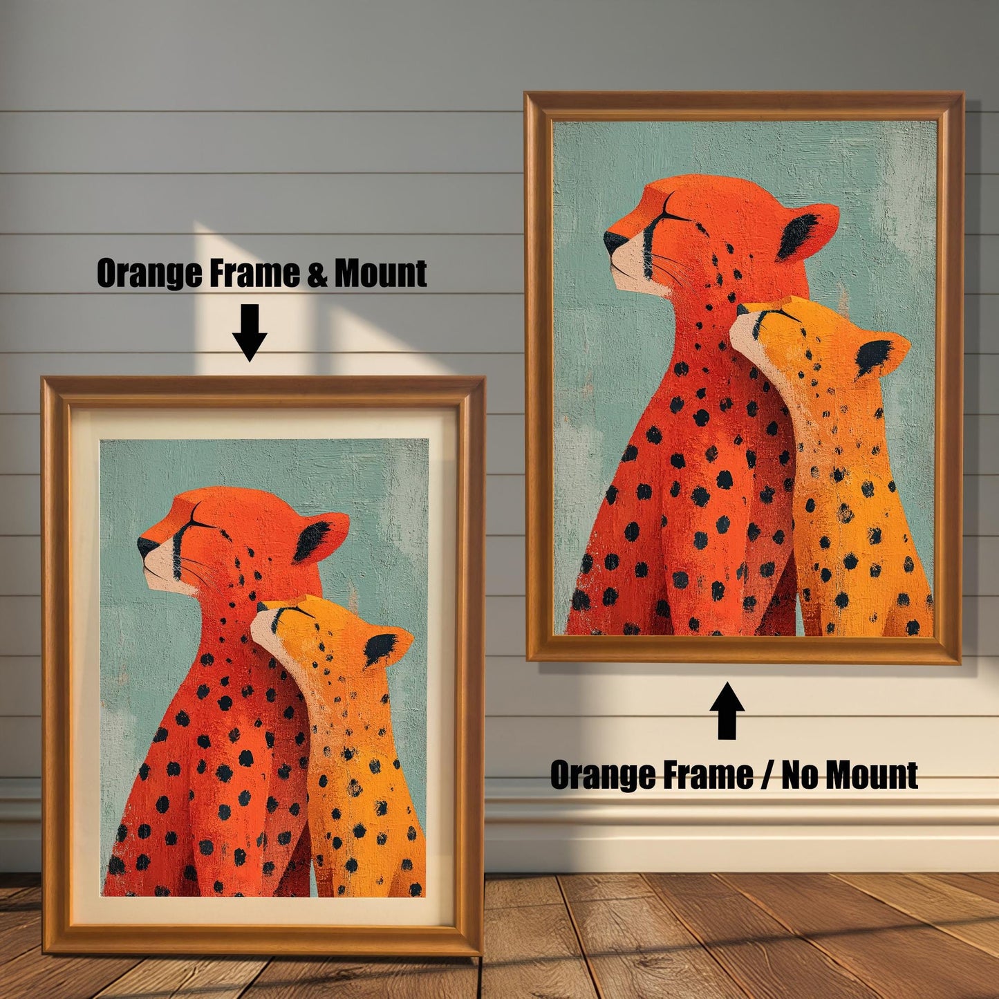 Two framed versions of the 'Cheetah Love' print against a white wooden wall. On the left is the Orange Frame with a light mount/matting. On the right is the Orange Frame without a mount.