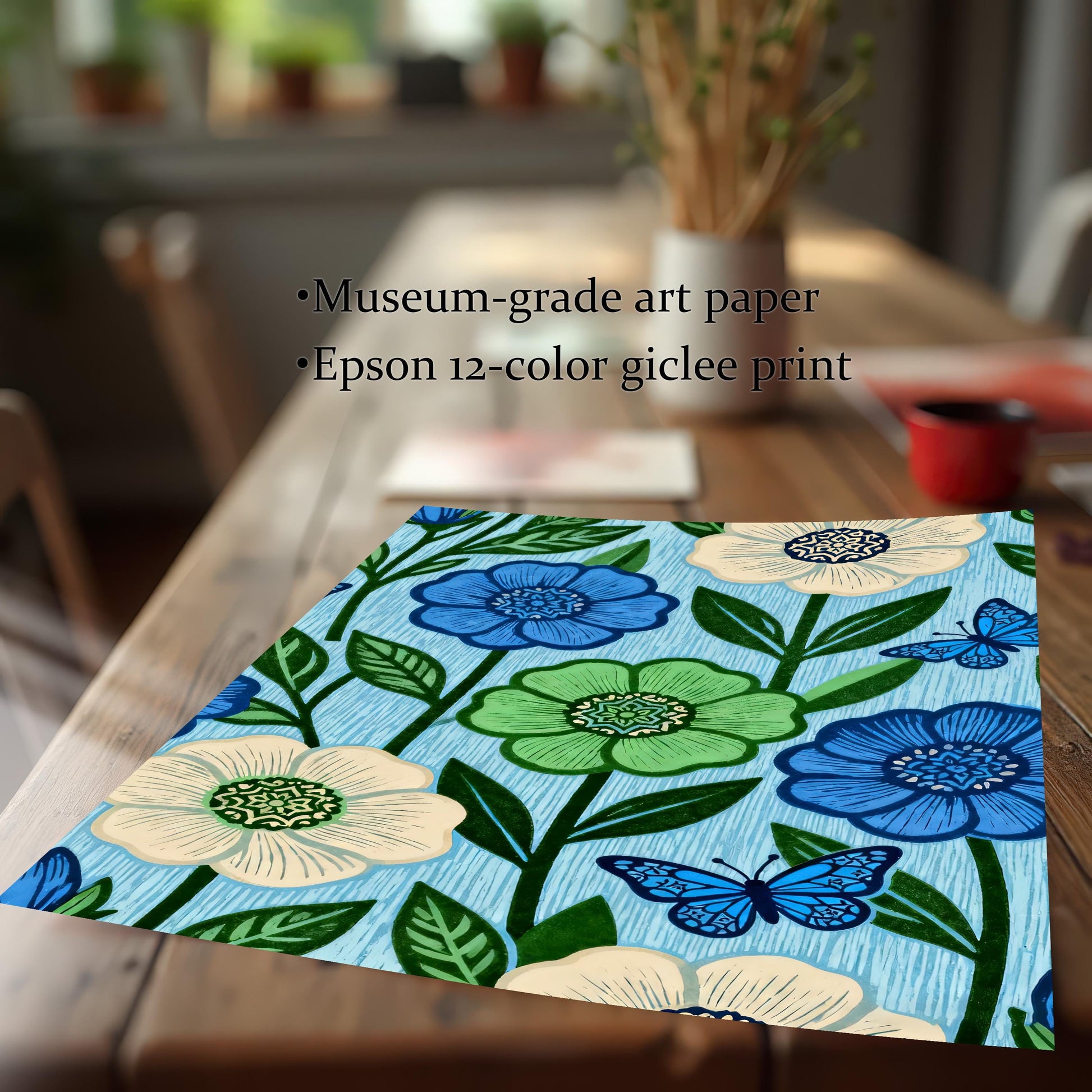Close-up of an unframed, loose print featuring the blue and green floral pattern artwork, resting on a wooden table. Text highlights print quality: Museum-grade art paper and Epson 12-color giclee print.