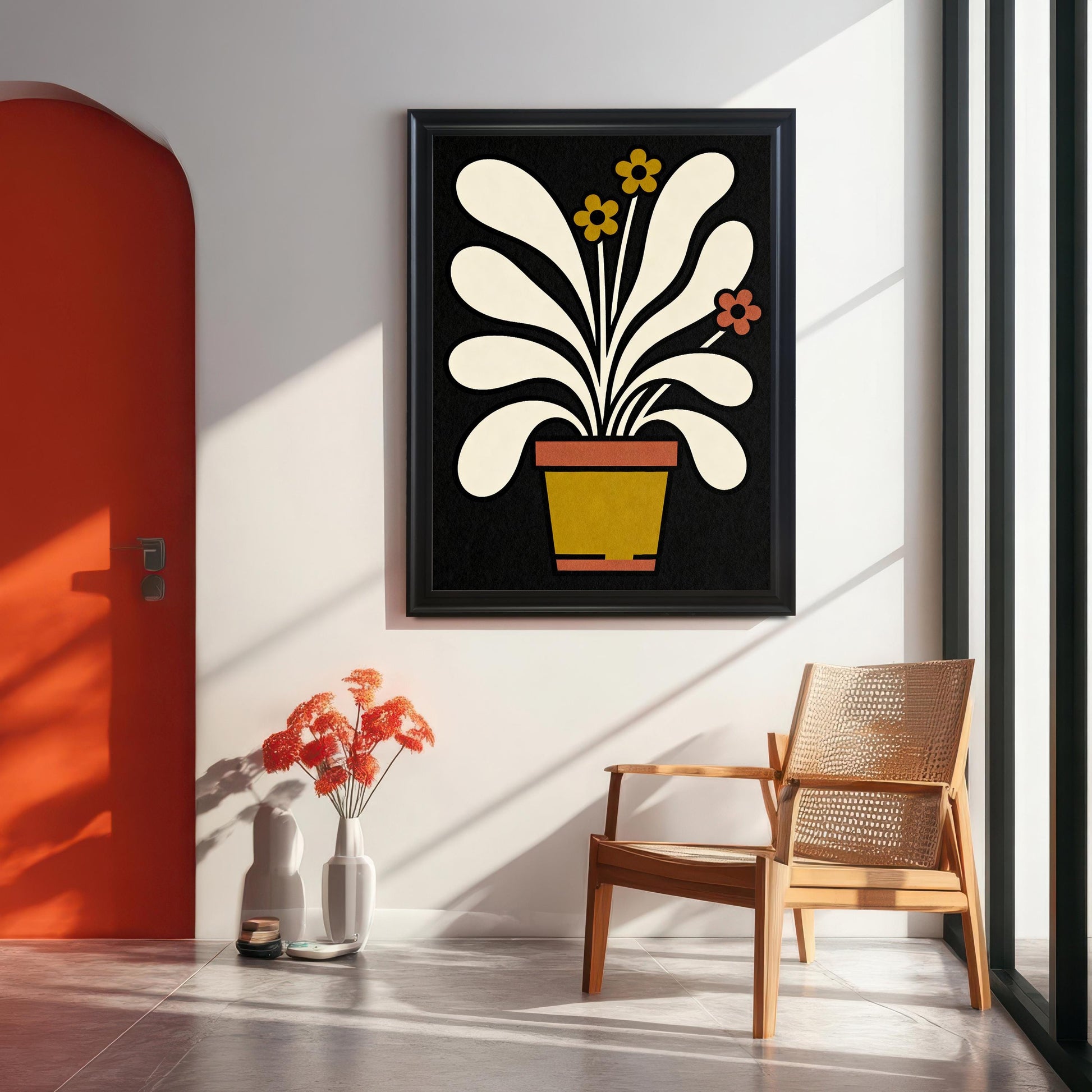 Full-view mock-up of the abstract potted plant art print in a Black frame, hanging on a white wall in a modern room with an orange arched doorway and a rattan armchair.