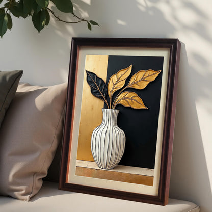 Coffee-colored framed art print with a light mount, featuring a white striped vase with black and gold leaves. The print is leaning against a wall on a bench, nestled beside two throw pillows, with sunlight casting shadows.