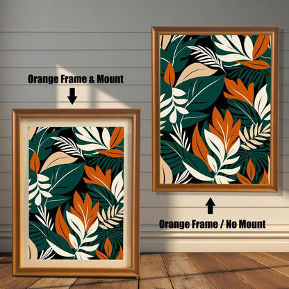 Abstract tropical leaf art print in an Orange colored wood frame with a mount/mat (left) and without a mount/mat (right). The vibrant print features dark green, burnt orange, and cream leaves on a black background.