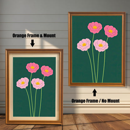 Comparison image showing the pink floral print in an Orange Frame & Mount (with a mount/mat) on the left, and an Orange Frame / No Mount (full bleed) on the right.