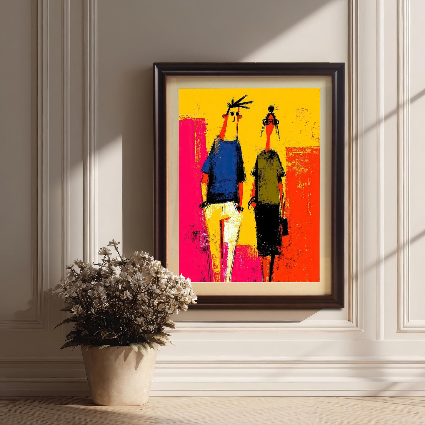 Framed abstract art print leaning against a white paneled wall with a vase of dried flowers nearby. The frame is a dark Coffee color with a Mount (matting).
