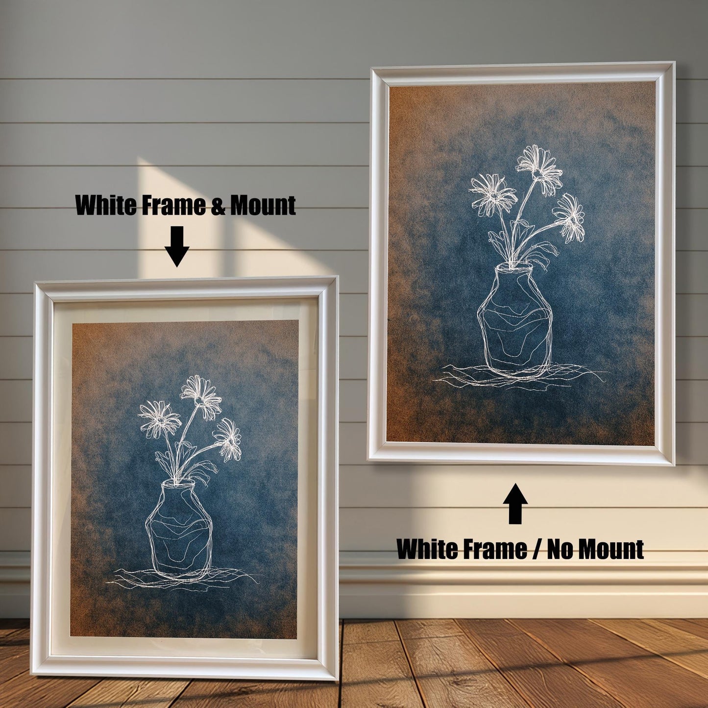 Comparison image showing two white framed art prints. The left print is a White Frame & Mount (with a mat board), and the right print is a White Frame / No Mount. The art is a white chalk-style flower drawing on a blue and orange textured background.