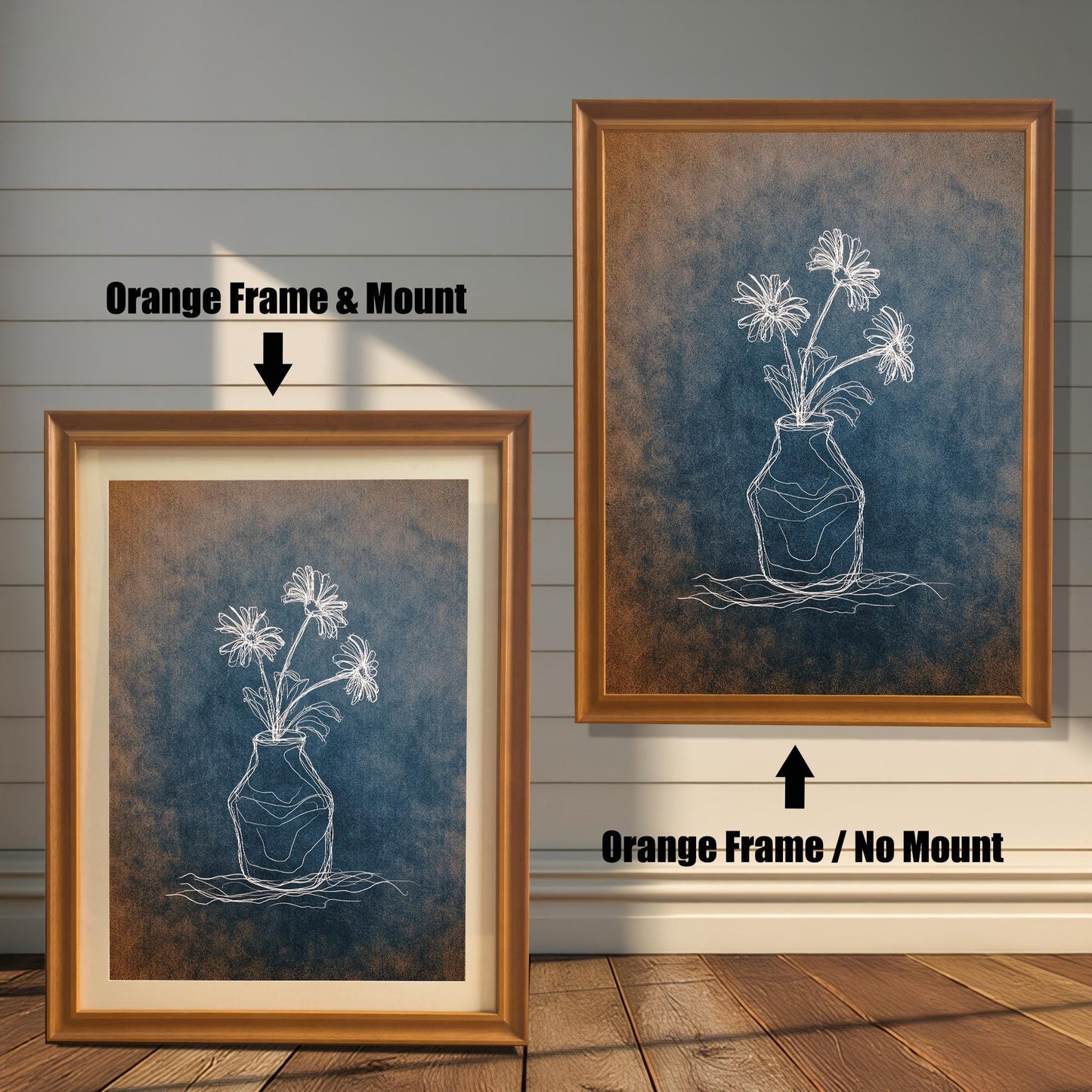 Comparison image showing two orange/light brown framed art prints. The left print is Orange Frame & Mount, and the right print is Orange Frame / No Mount. The art is a white chalk-style flower drawing on a blue and orange textured background.