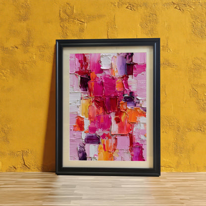 Abstract oil-style painting in a black wooden frame with an off-white mat, leaning against a heavily textured, vibrant yellow-orange wall above a light-colored wood plank floor.