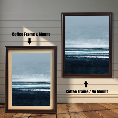 Comparison image showing the Coffee (dark brown) frame options for the seascape print: on the left, a framed print with a cream-colored mount/mat; on the right, the print in a Coffee frame with no mount. Both on a white paneled wooden wall background.