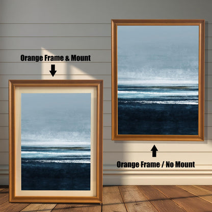 Comparison image showing the Orange wood frame options: on the left, a framed seascape print with a mount/mat; on the right, the print in an Orange frame with no mount. Both on a white paneled wooden wall background.