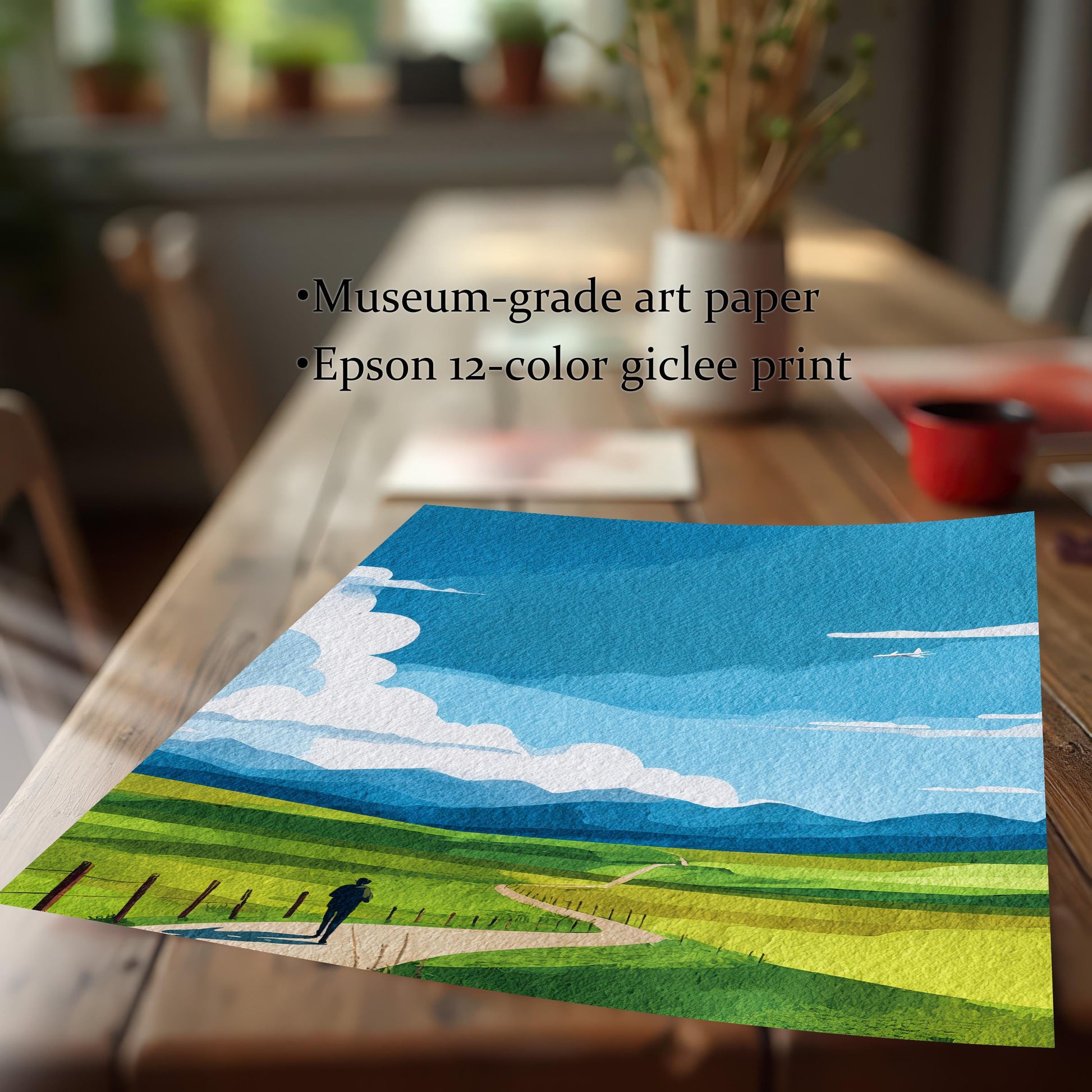 Detail image of the colorful green and blue landscape art print (unframed) lying on a wooden table. Text highlights the quality: Museum-grade art paper and Epson 12-color giclee print.