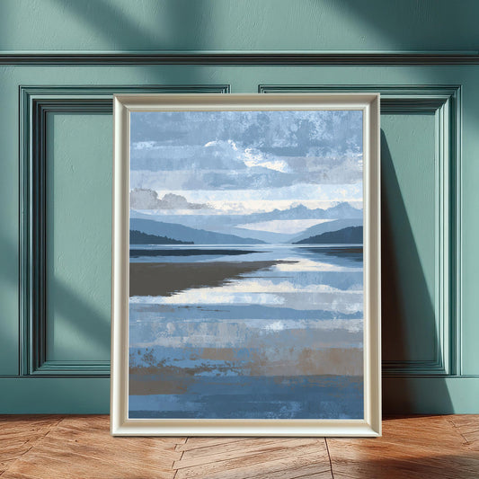 Abstract landscape art print with blue, gray, and brown horizontal brushstrokes depicting a lake reflection and distant mountains, framed in white wood and leaning against a dark teal wainscoted wall.