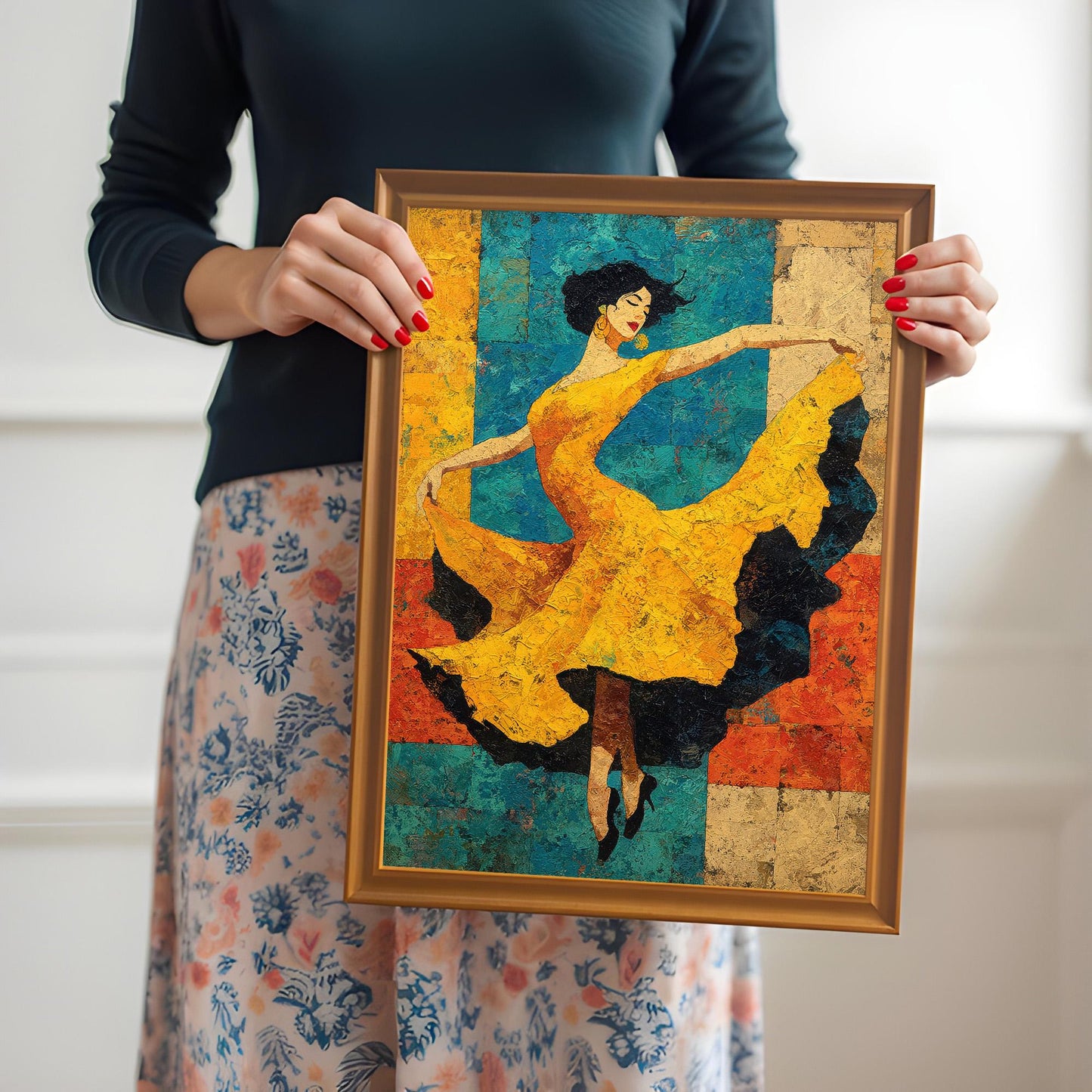 A person wearing a black top and a floral skirt holds an art print with an Orange Frame / No Mount up in front of their torso, providing a sense of scale.