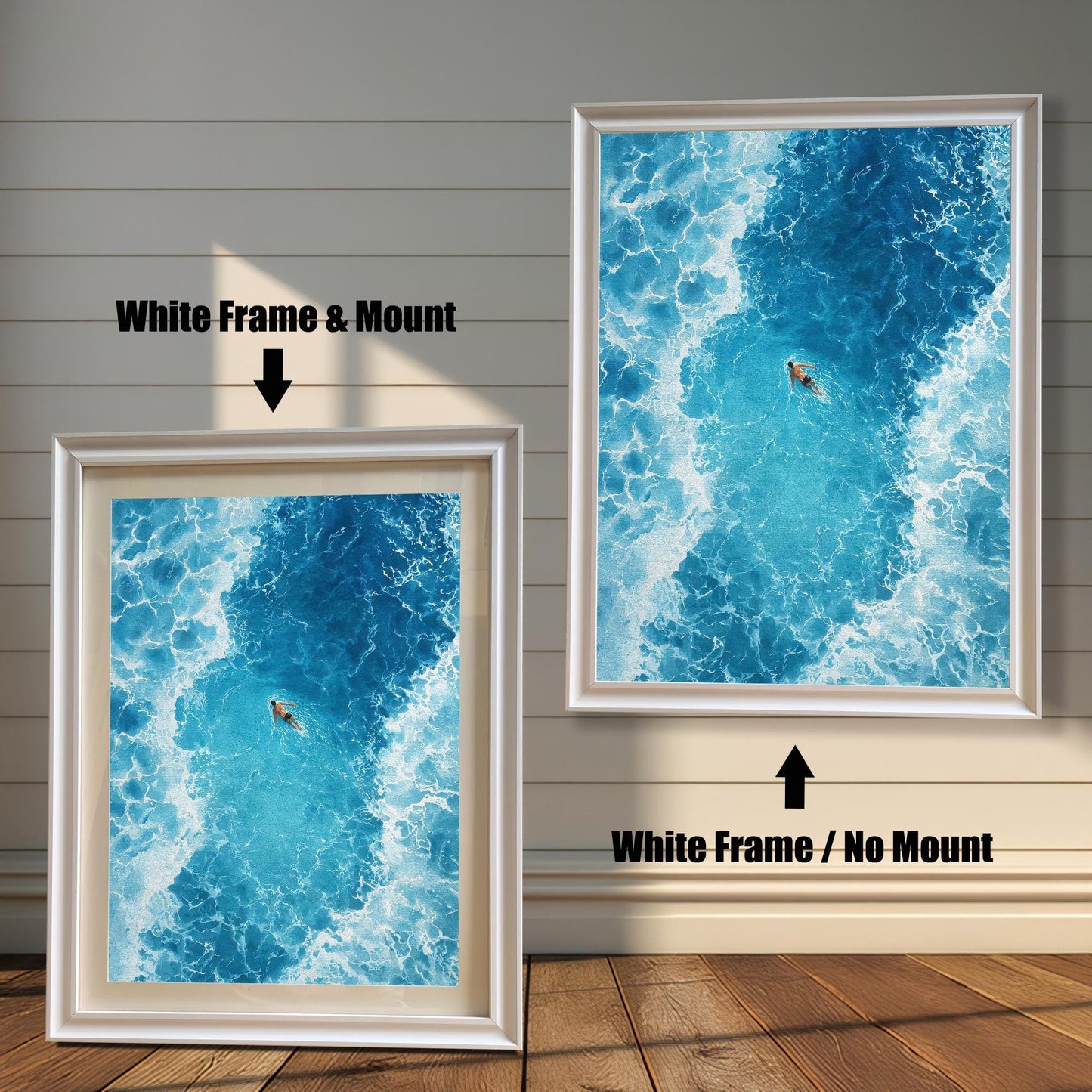 Comparison of the ocean art print with a White frame. The image on the left has a 'Mount' (mat board) and is leaning against the wall. The image on the right is hanging and has 'No Mount'. Both have a white wood frame.