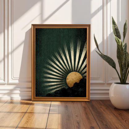The dark green and gold sunburst art print in a gold/orange wooden frame, standing on a hardwood floor, leaning against a white wainscot wall next to a tall potted snake plant.