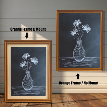 Comparison image showing two orange/light brown framed art prints of the chalk drawing. The left print is an Orange Frame & Mount (with a mat board), and the right print is an Orange Frame / No Mount.