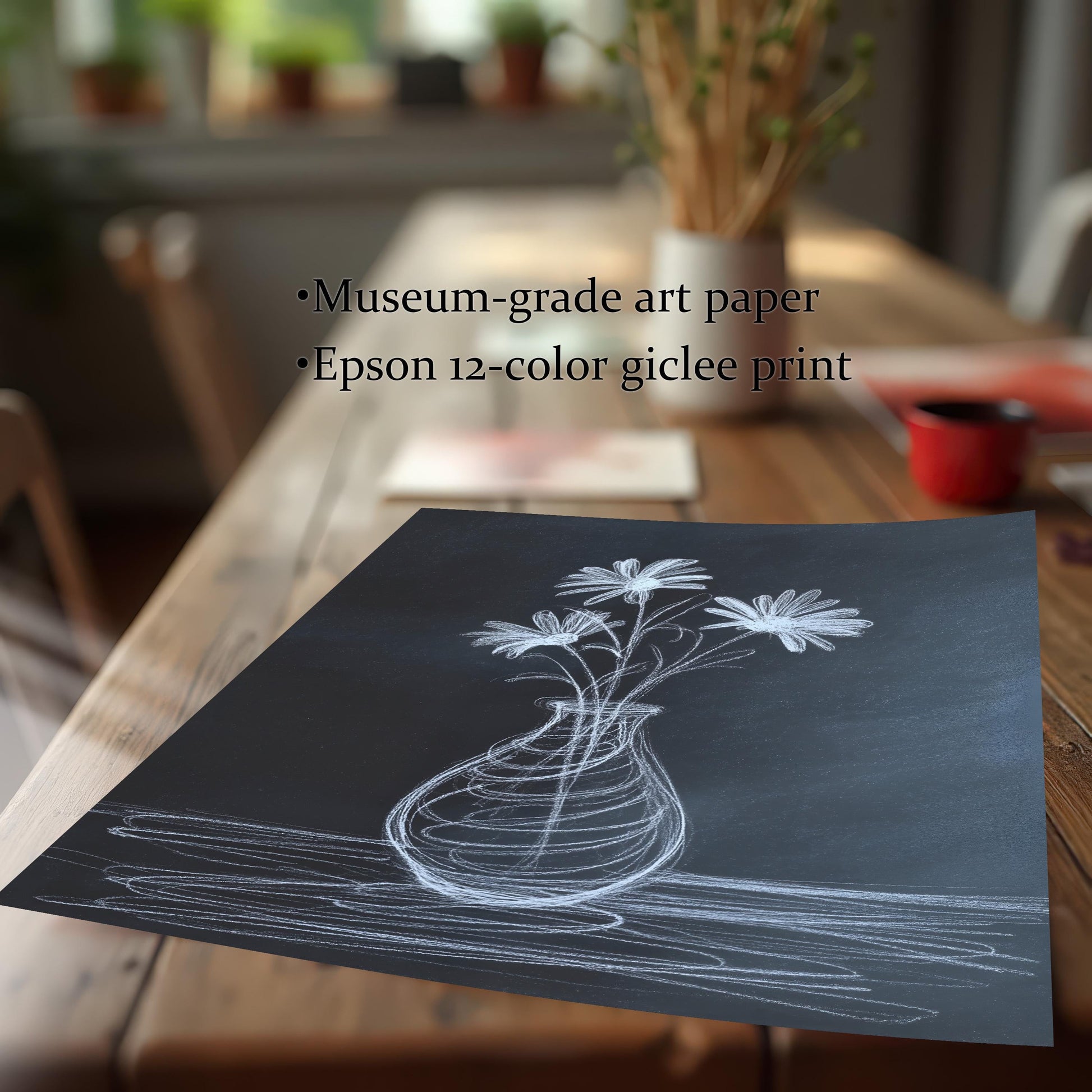 Close-up of the chalk flower print lying on a wooden table, emphasizing the print quality. Text overlay lists product features: ""Museum-grade art paper"" and ""Epson 12-color giclee print.""