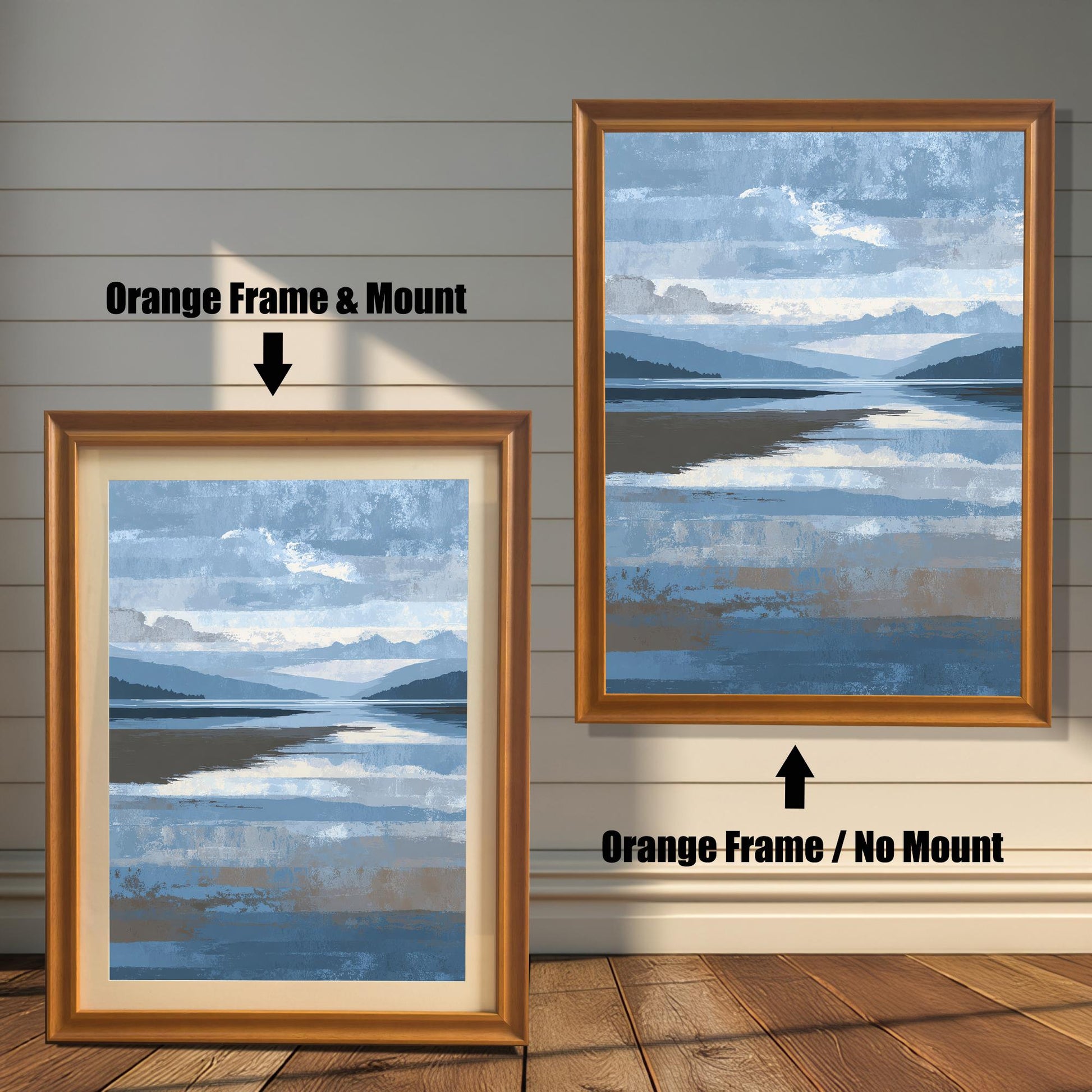 Comparison image showing the abstract landscape print in an Orange Frame with a light-colored Mount (matting) on the left, and the same print in an Orange Frame with No Mount on the right, against a white wooden wall.