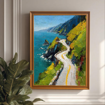A framed print of a vibrant oil painting of a winding coastal road, hanging on a classic white wainscoted wall, next to a large potted fig-leaf plant. The frame is Orange (light brown wood color).