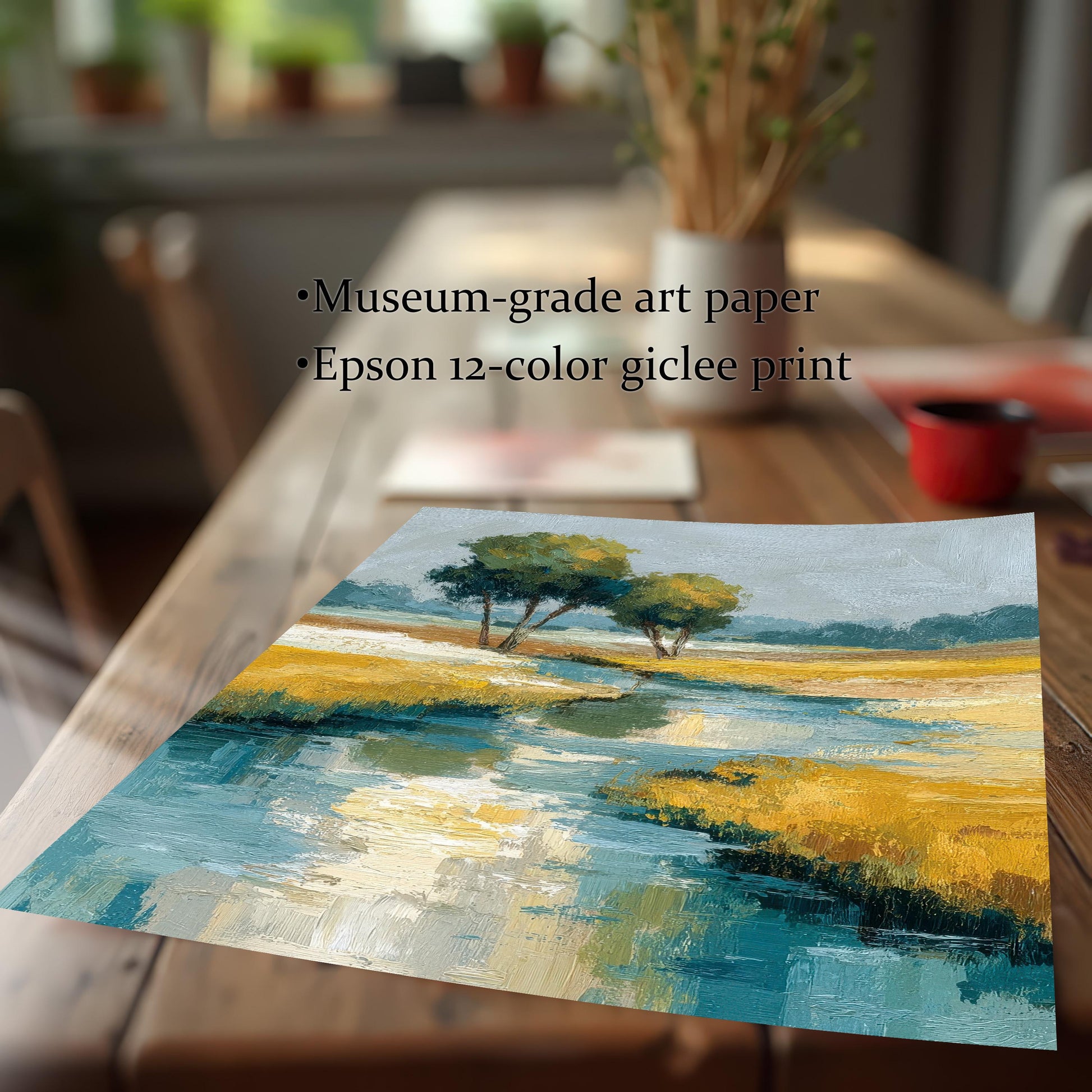 A detail shot of the abstract landscape print laying on a wooden table, showing the textured artwork up close. Text reads: ""Museum-grade art paper,"" ""Epson 12-color giclee print,"" emphasizing print quality.