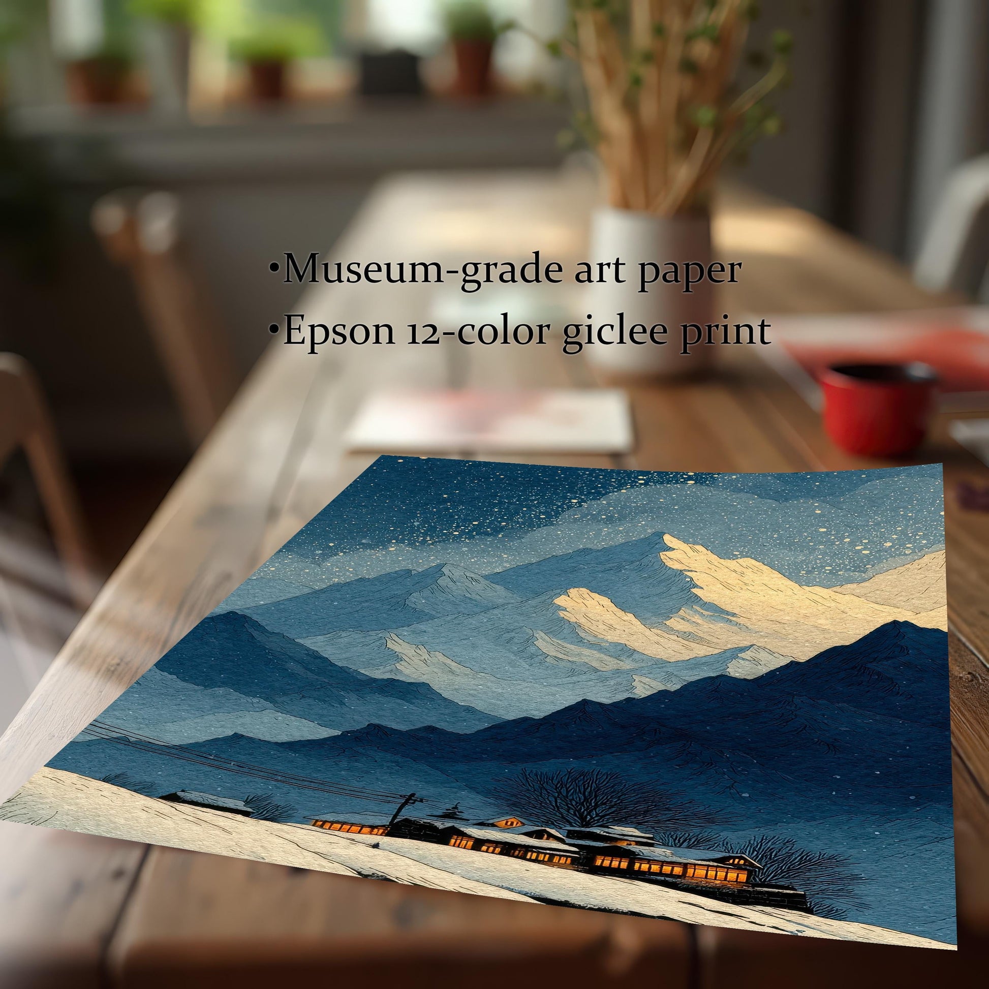A detail shot of the mountain art print laying on a wooden table, showing the texture and detail of the artwork. Text reads: ""Museum-grade art paper,"" ""Epson 12-color giclee print,"" emphasizing print quality.