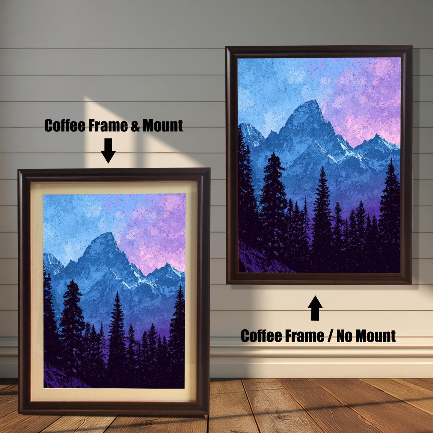 Side-by-side view of a mountain art print. On the left, a smaller print is shown with a Coffee Frame & Mount (dark brown matting). On the right, a larger print is shown with a Coffee Frame / No Mount. Both are against a light wood-paneled wall.