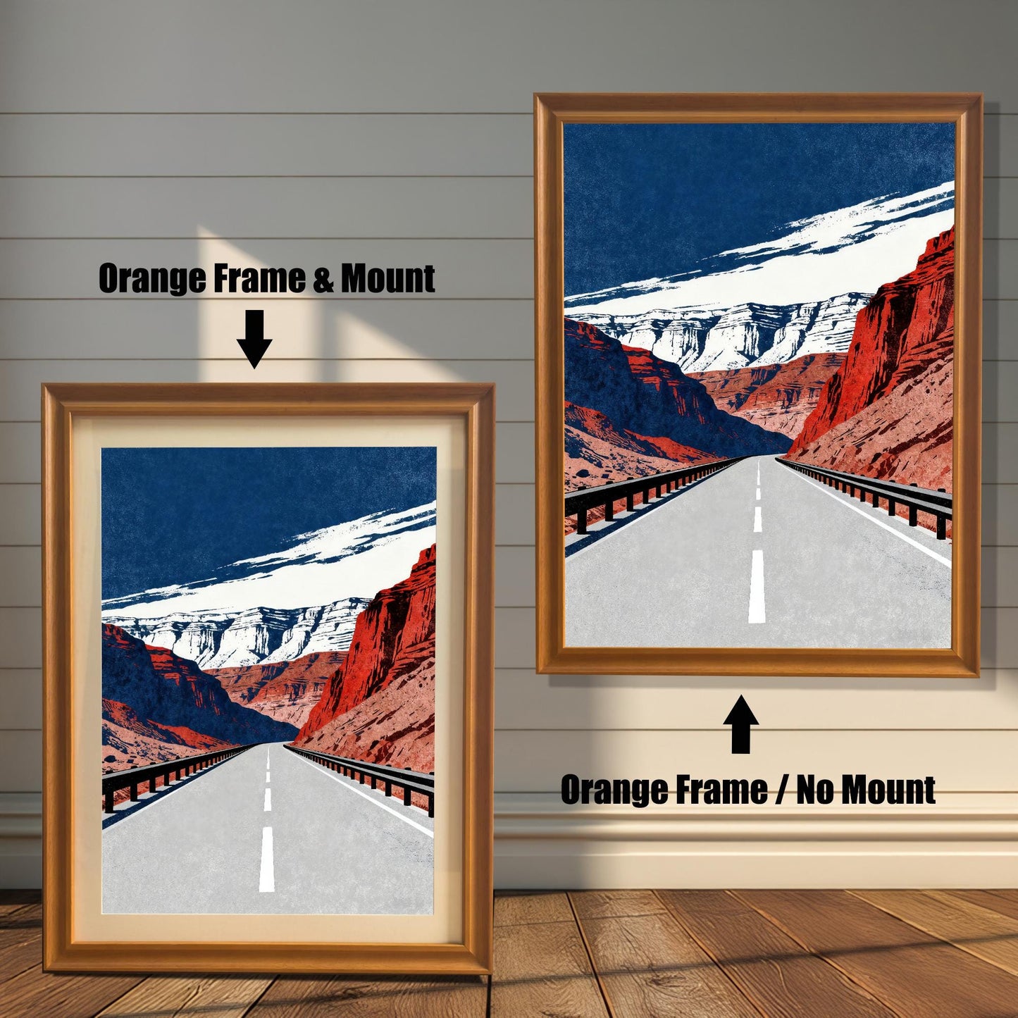 A side-by-side comparison of a framed art print. The image on the left has an Orange Frame & Mount (a white border or matting) and the image on the right has an Orange Frame / No Mount. The art depicts a long, straight road through red rock canyons under a dark blue and white sky.