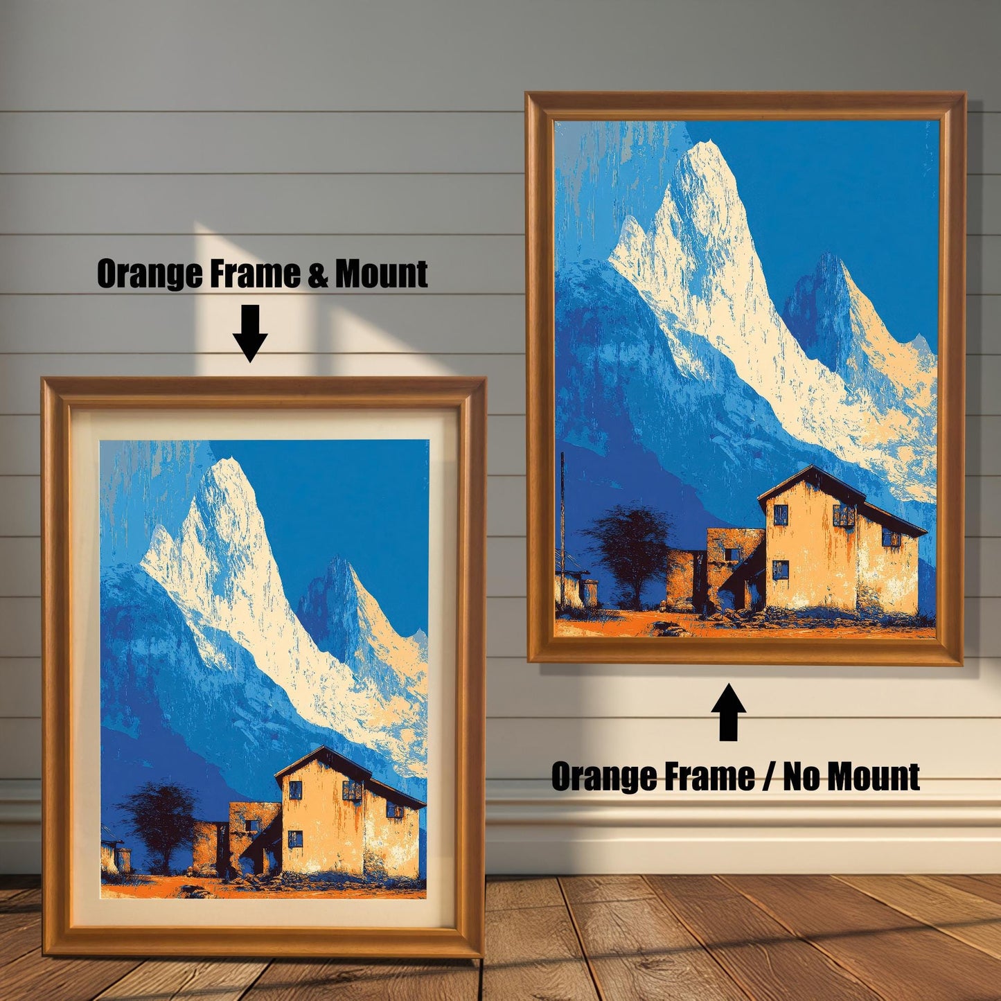 Landscape art print, side-by-side comparison of an orange/light brown wood frame with a mount (mat) and an orange wood frame with no mount, against a white panel wall.
