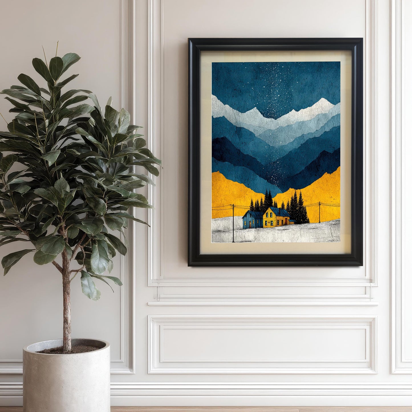 The art print in a Black Frame with a mat/mount hanging on a white paneled wall next to a large potted fiddle-leaf fig plant.