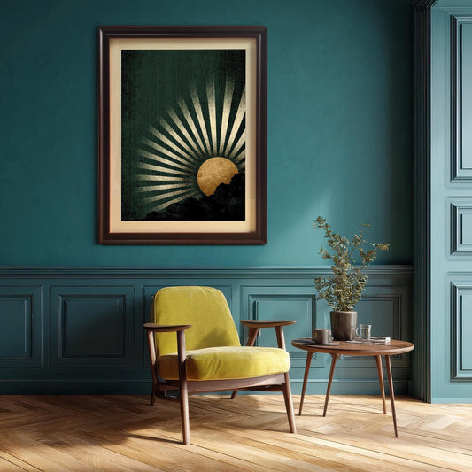 A framed painting of a bright coastal beach scene with waves and cliffs, hanging on a teal/dark green paneled wall above a yellow armchair and a small wooden side table with a potted plant.