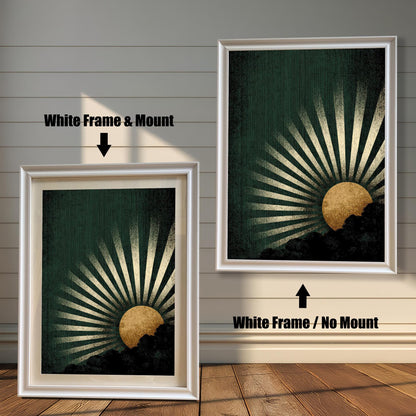 A side-by-side comparison of the dark green and gold sunburst art print framed in a White Frame. The image on the left shows the print with a mount (matting), and the image on the right shows it without a mount.