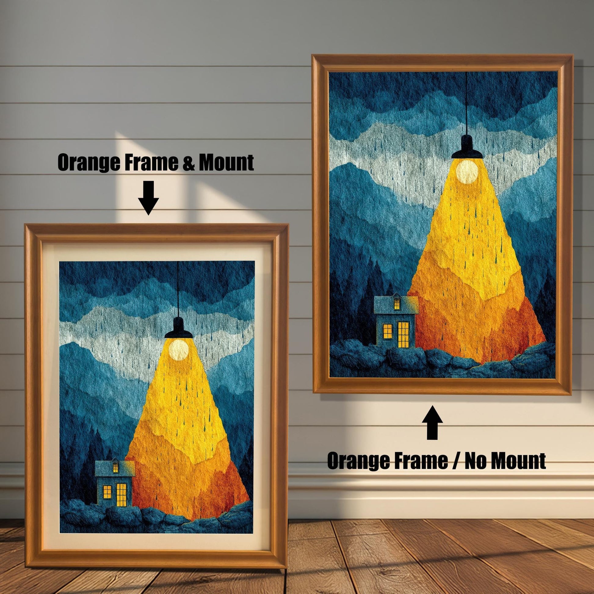 Side-by-side comparison of the "Spotlight House" art in an Orange wood frame; the left version includes a cream-colored mat board (mount) and the right version is full-bleed without a mount.