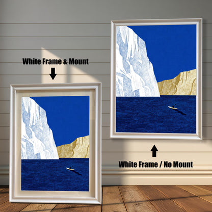 Side-by-side display of white wood frames, showing the "White Frame & Mount" option versus the "White Frame / No Mount" option for a blue iceberg print.
