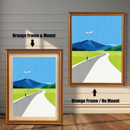Two side-by-side examples of a minimalist landscape art print in orange wood frames; the left version includes a cream-colored mat mount, while the right version is a full-bleed print with no mount.