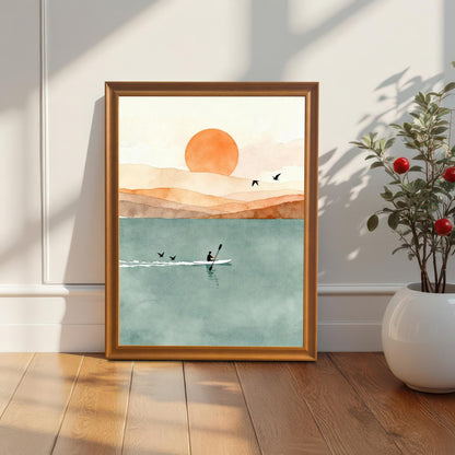 Orange wood frame without a mount featuring a kayak on a teal lake, placed on a hardwood floor next to a white potted plant.