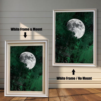 Side-by-side comparison of white wood frames: one featuring the moon art with a white mat board and one showing the full-bleed print with no mount.