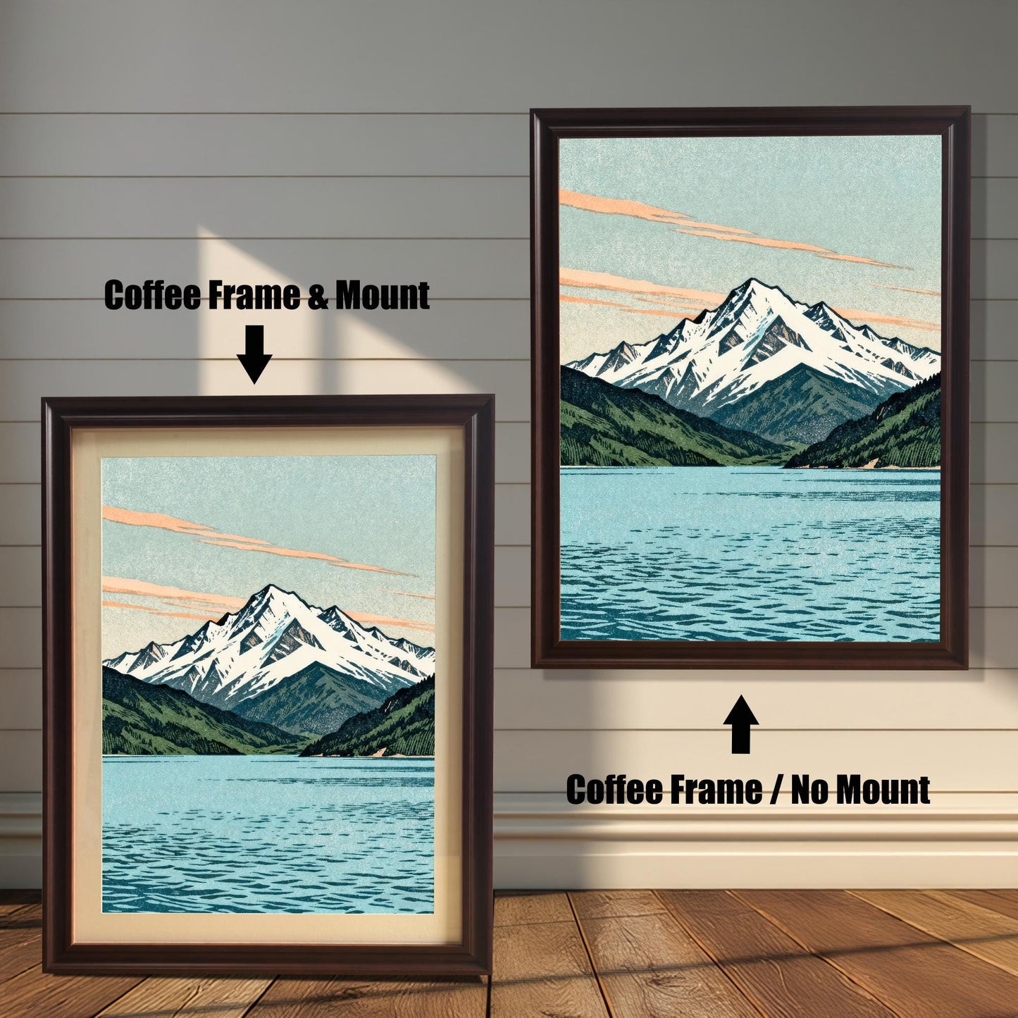 Two side-by-side examples of the mountain art print in coffee-colored (dark brown) wood frames; the left image includes a cream-colored mat board (mount), while the right image shows a full-bleed print with no mount.