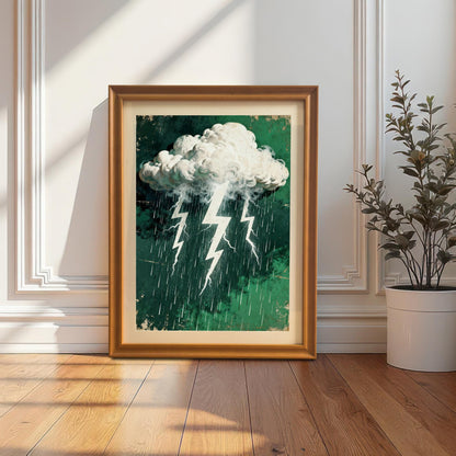 The stormy cloud and lightning art print in a gold-colored 'Orange' wood frame with a cream mount, leaning on a wooden floor against a white paneled wall, beside a potted plant.