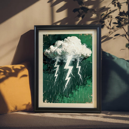 A black-framed mountain landscape art print with purple mountains and a blue sky, propped on a couch between a mustard yellow and a dark green pillow, with shadows from a nearby plant.