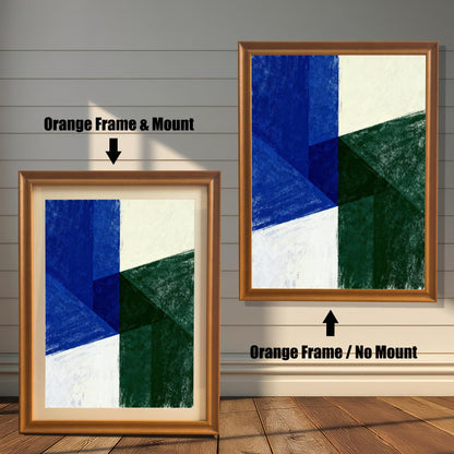 Comparison image of two framed prints against a light wooden wall. The left print shows an Orange Frame & Mount (with a beige border/mat). The right print shows a larger Orange Frame / No Mount. Both display the same geometric abstract artwork in blue, green, and white.